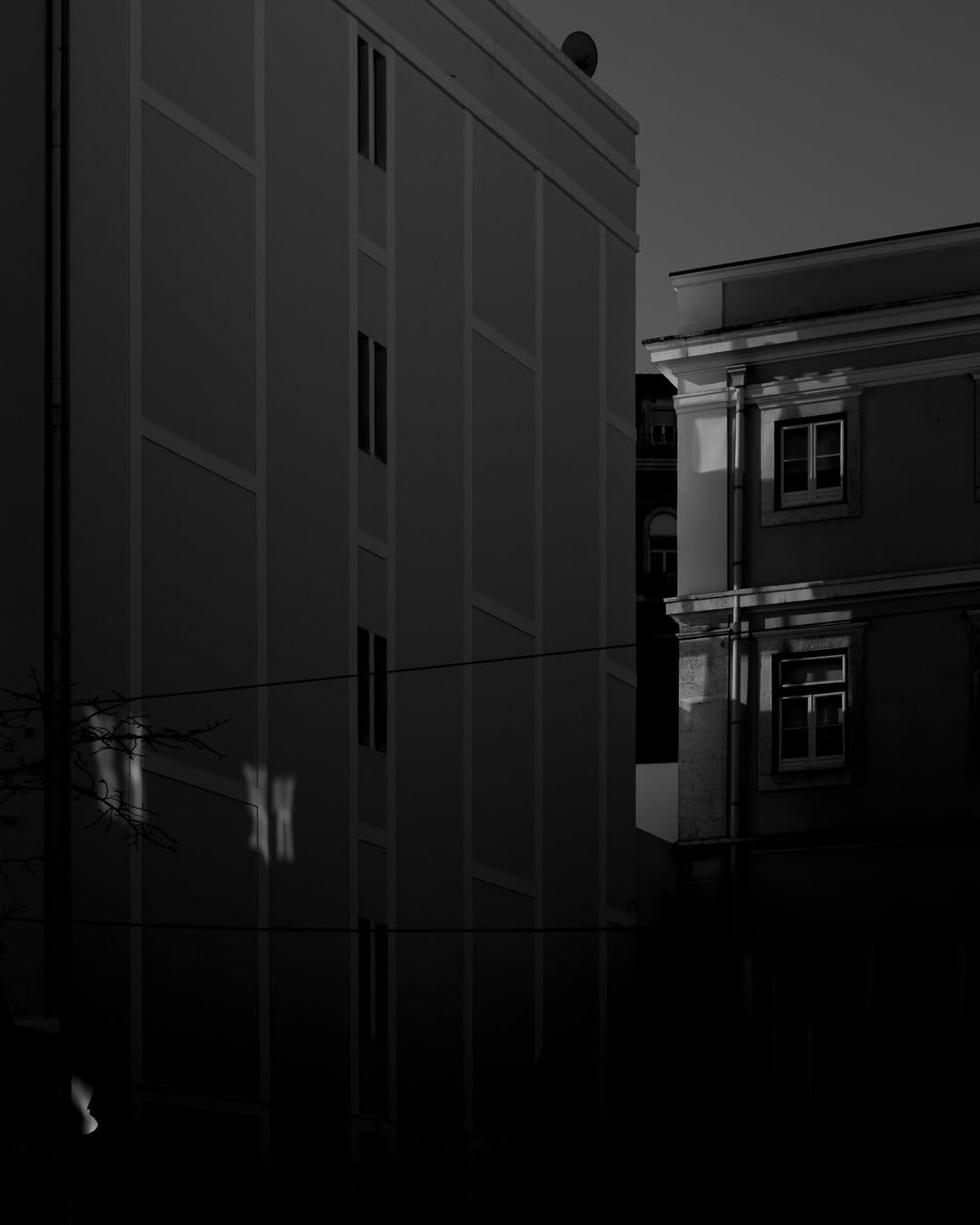 The corner of an apartment facade