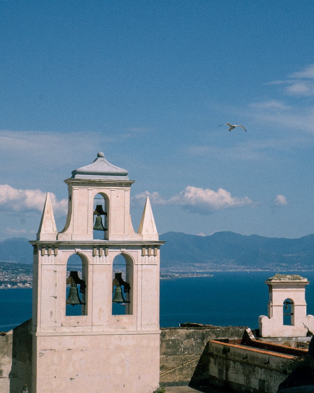 A bell tower above the sea